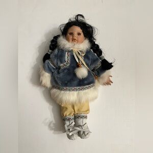 ARCTIC CIRCLE 12” PORCELAIN FACE GIRL ESKIMO WITH BLUE PARKA DOLL